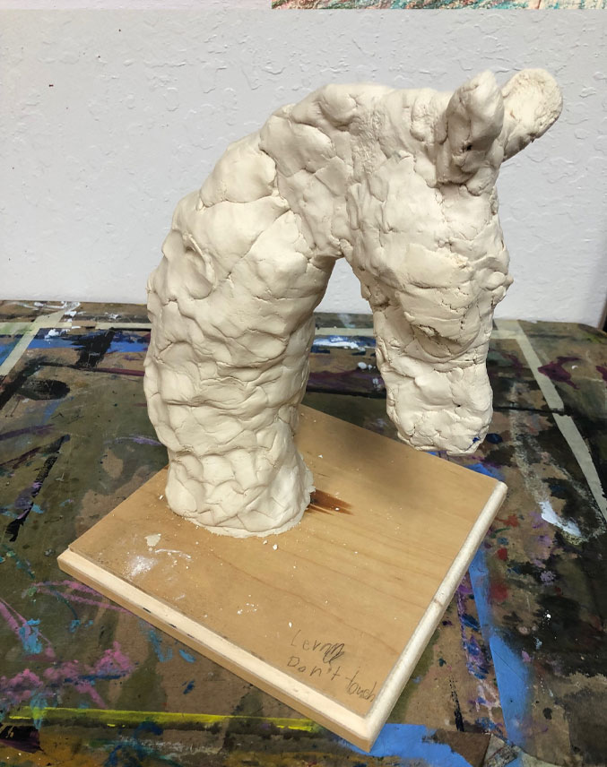 More clay added to sculpture